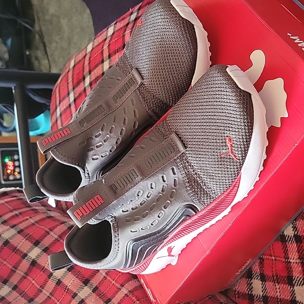 New in box Puma mens size 8 shoes grey and red with white soles.